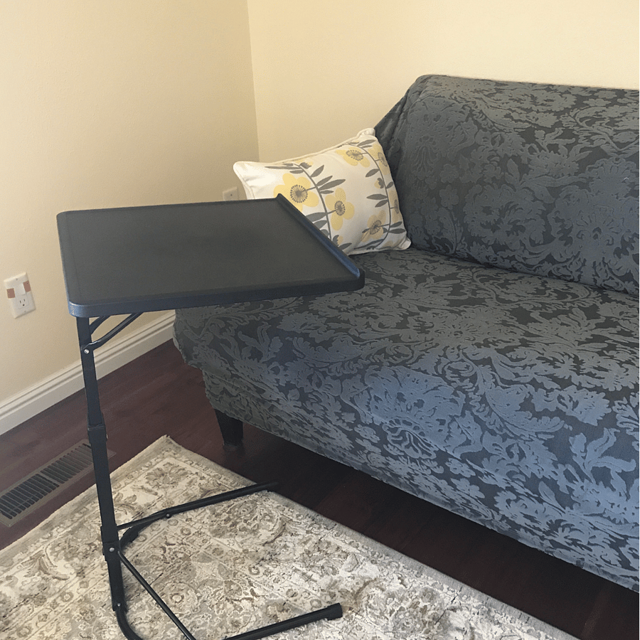 Computer stand where you can relax on the couch while checking email.