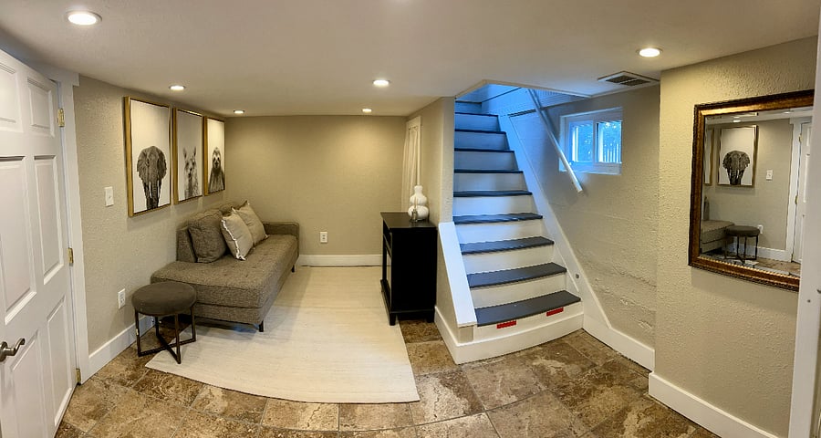 Basement living area with electric fireplace