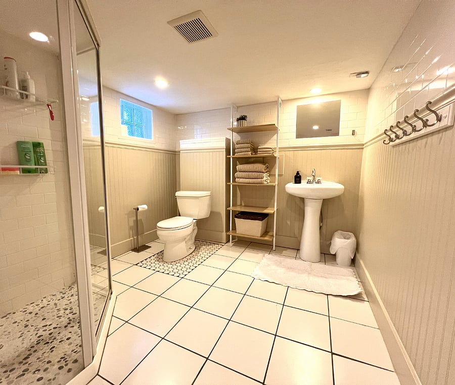 Spacious lower-level bathroom.
