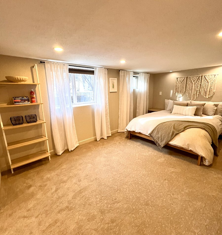 Large lower level bedroom, queen bed.