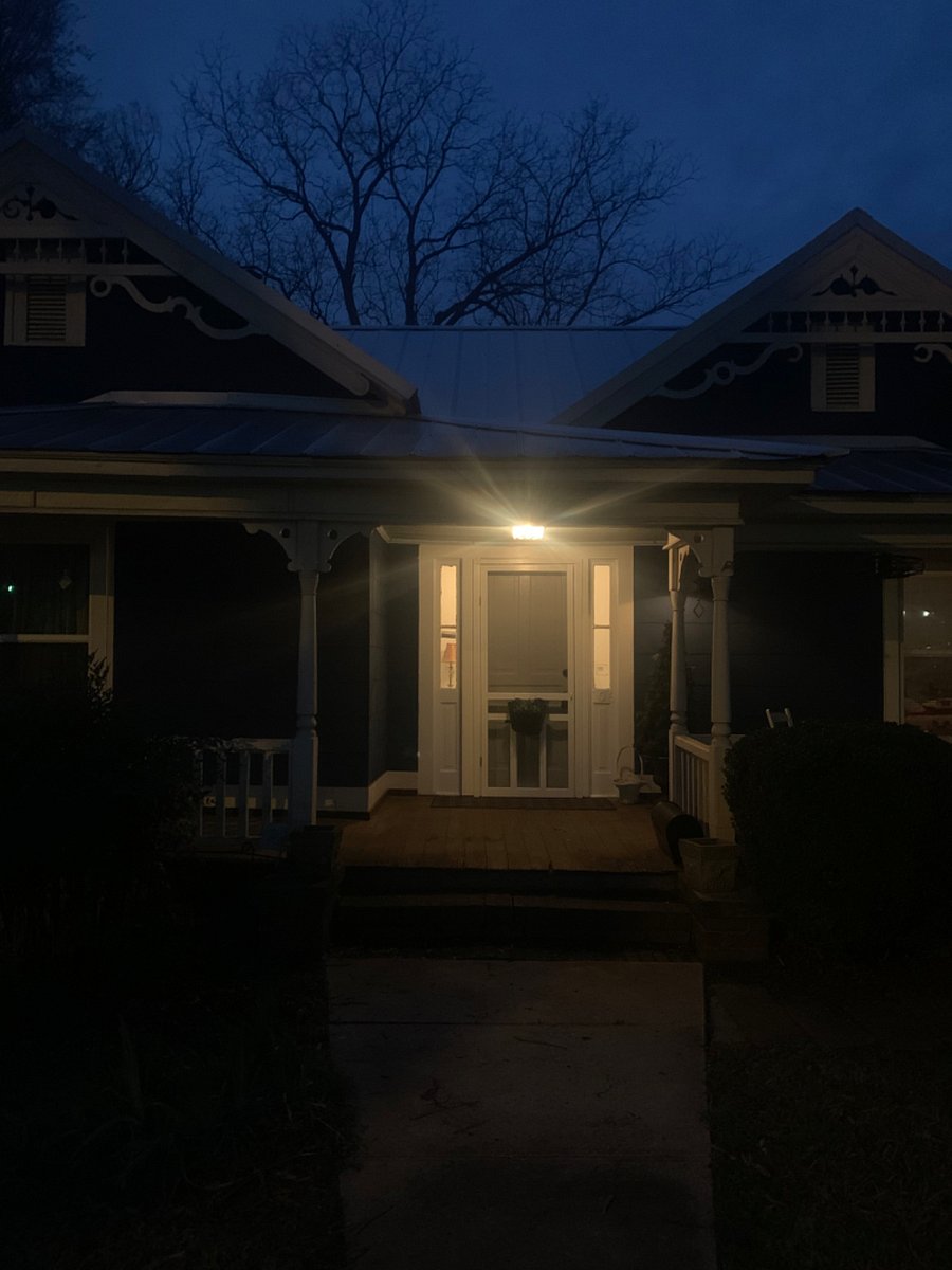 Well lit, motion detected private front door entrance offers access to this spacious apartment spanning the front of the home.