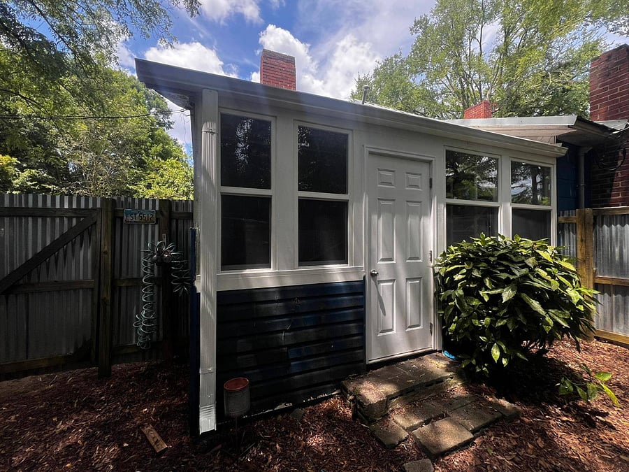 Separate entrance to shared laundry and fenced in pet area spaces