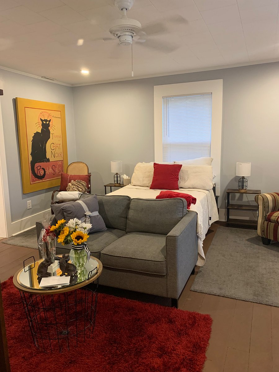 Living area with full sized bed for original studio offering.
