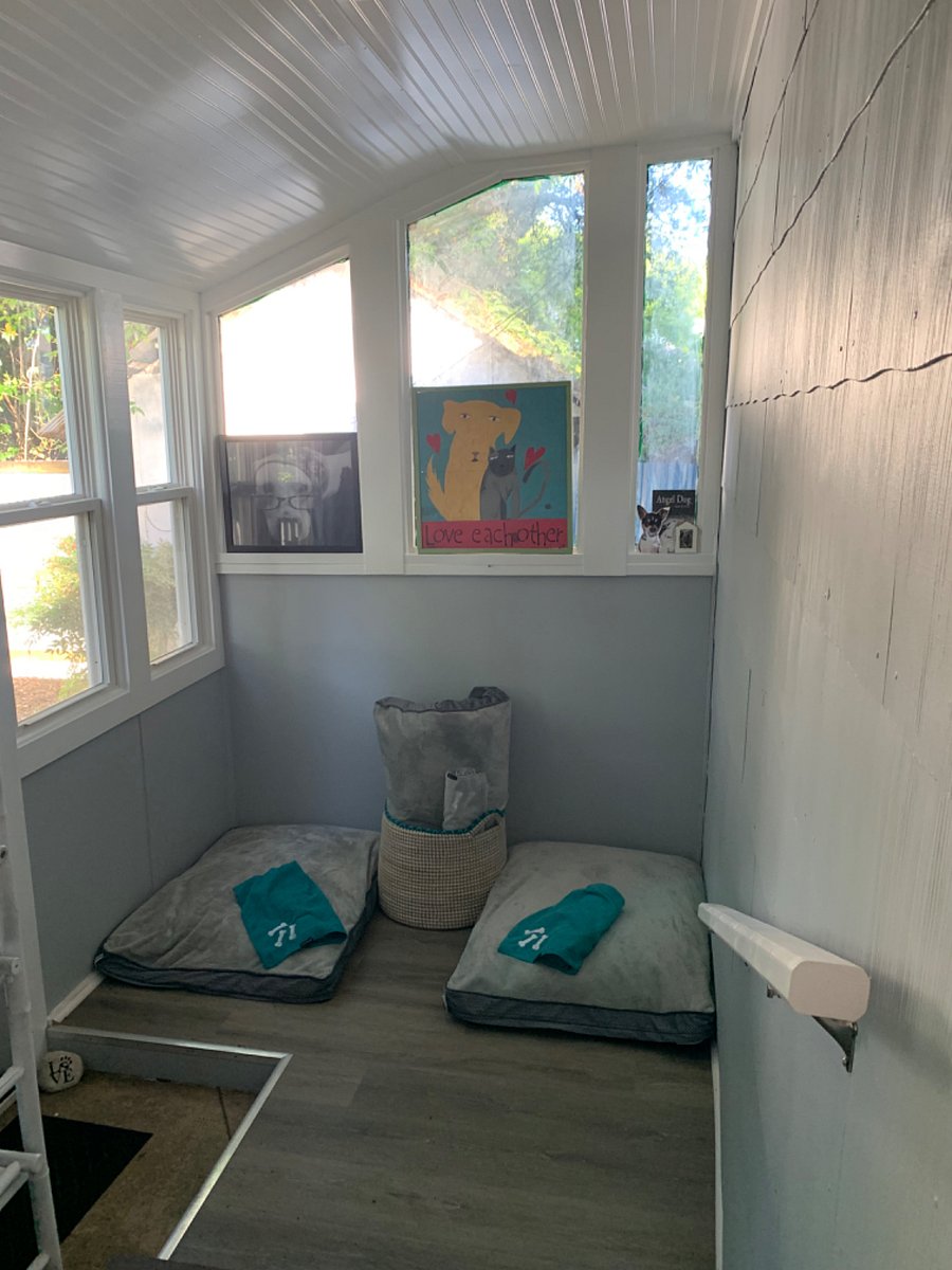Adorable shared spaces for laundry and pets.