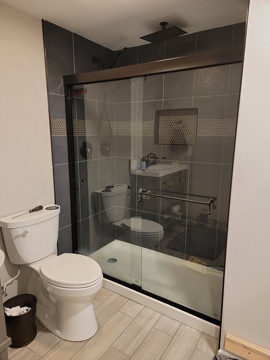 Second bathroom in basement with rain shower head.