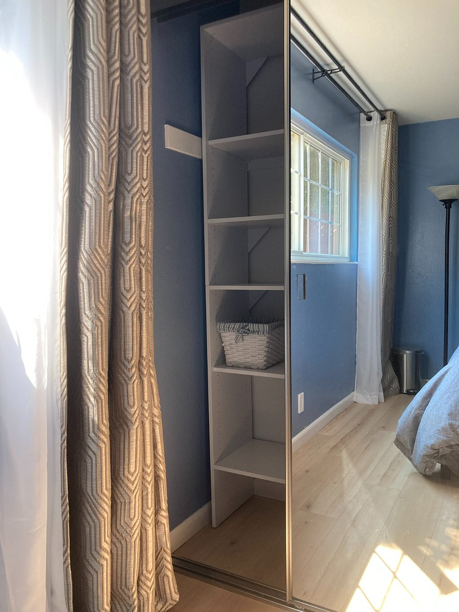 Closet in your bedroom with mirror sliding doors