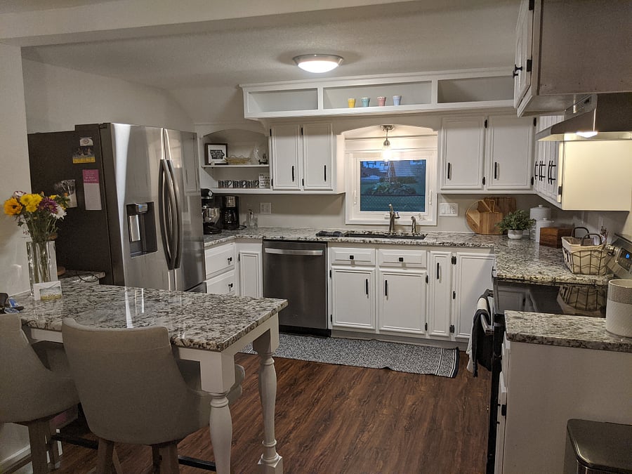 Kitchen. Fully Furnished with pots, pans, baking supplies, full refrigerator, stove, microwave and coffee pot.