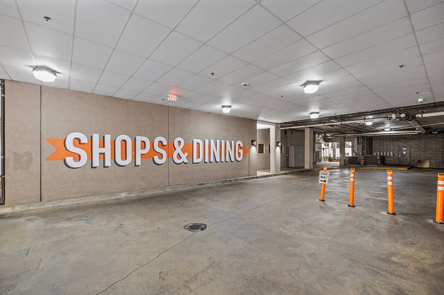 First floor above ground parking for Shops and restaurants. 2 more parking decks secured below ground reserved for residents