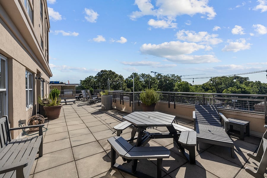 Rooftop terrace with grill and seating for out door enjoyment