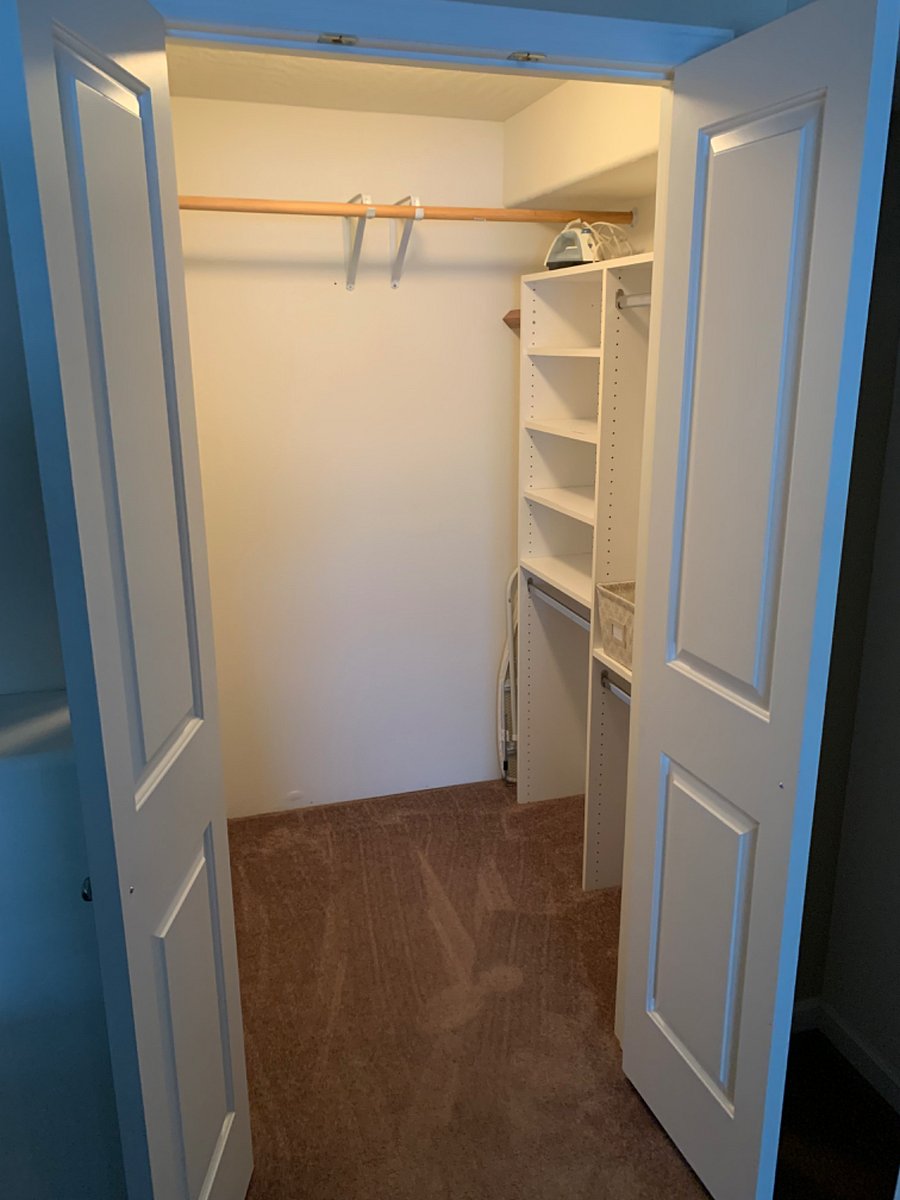 Main bedroom walk in closet.