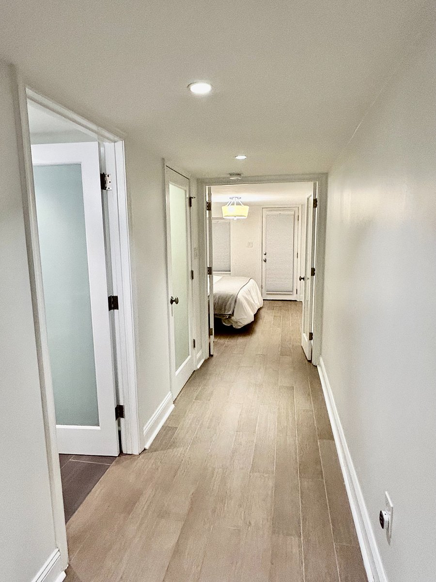 Hallway to bathroom and bedroom.