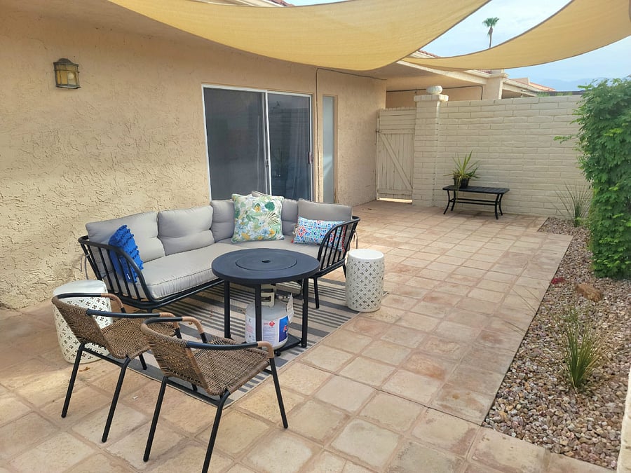Private patio; both bedrooms overlook this area with fire pit