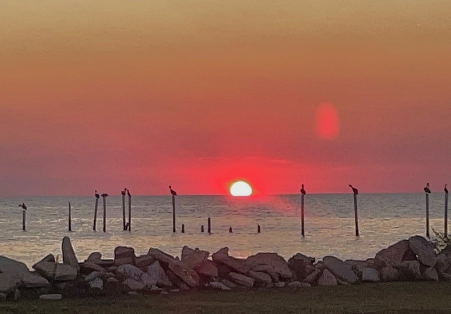 Sunset as seen from the neighborhood beach.