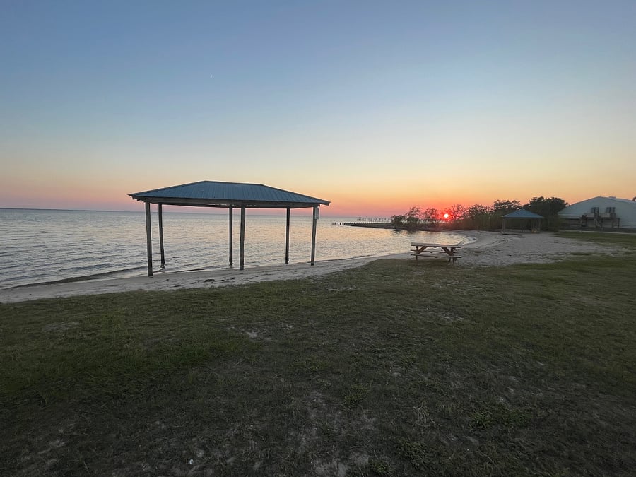 This is the sand beach located a short walk down the street at sunset.