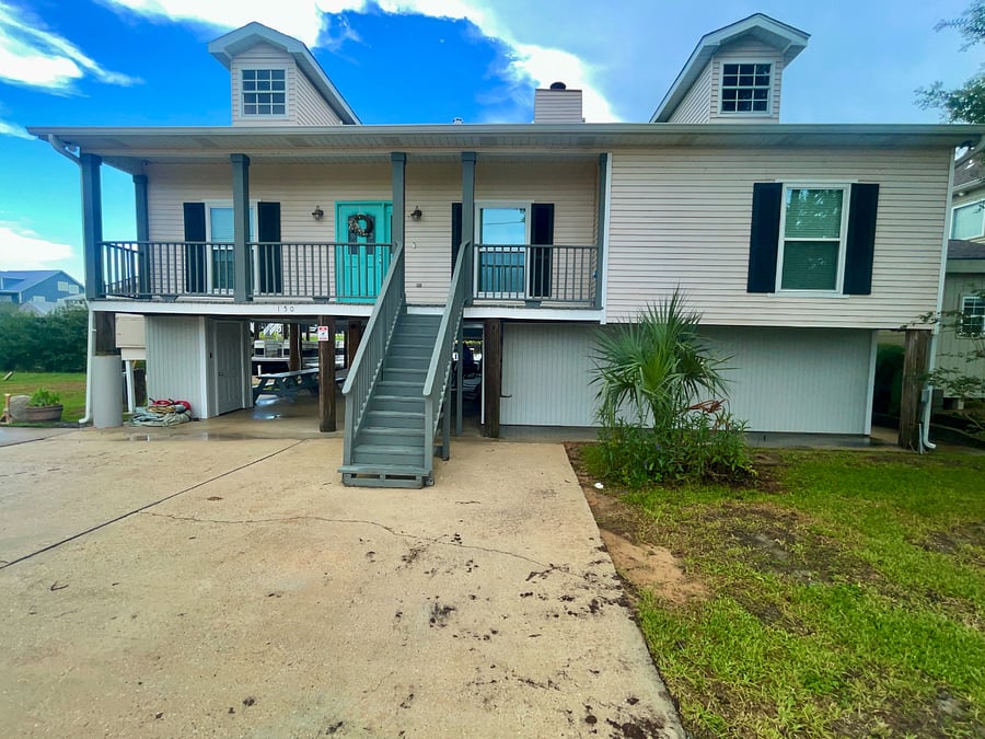 View of house showing front stairs. There are rear stairs and an elevator as well.