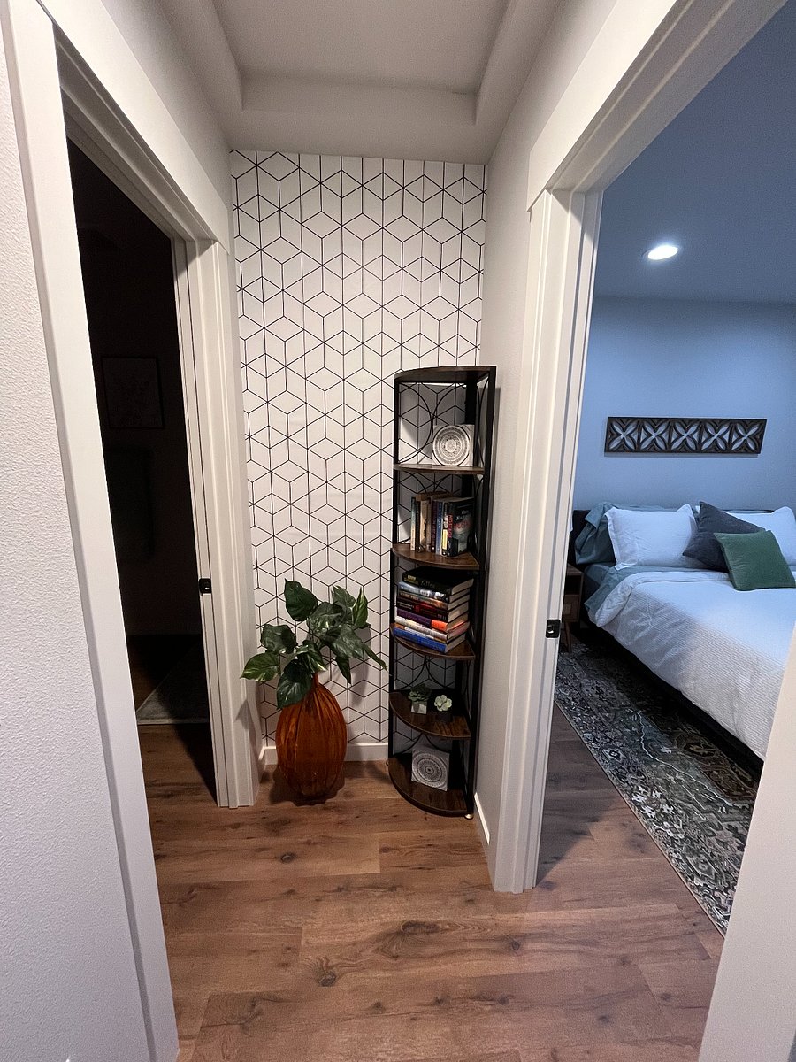 Hallway between bathroom and bedroom