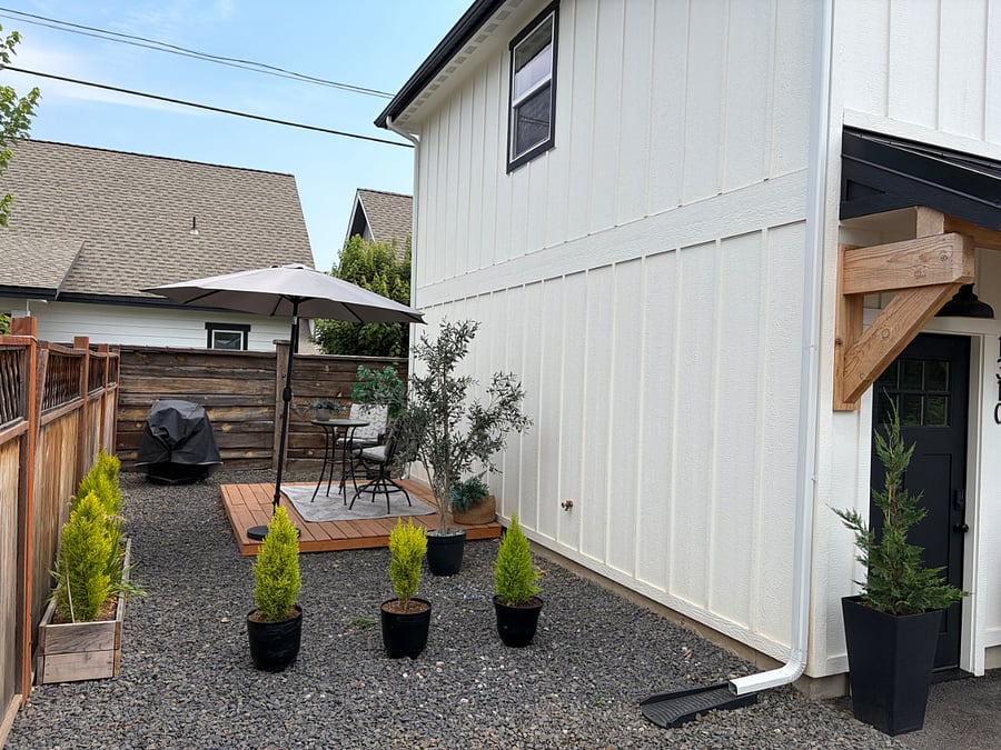 Deck with table chairs and bbq for the tenants