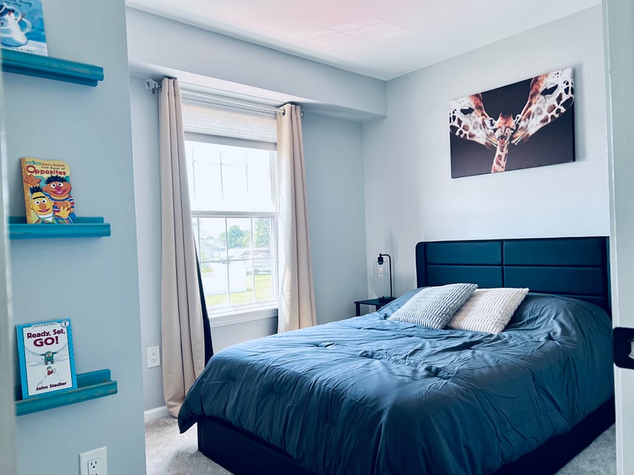 Brand new full size bed with pull out drawers. Night stand with an industrial lamp with the option to charge multiple devices.