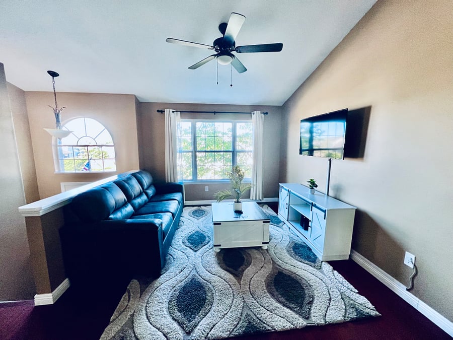 Queen sleeper sofa comfortably sleeps an additional 2 guests. Pillows, sheets, and comforter are provided.