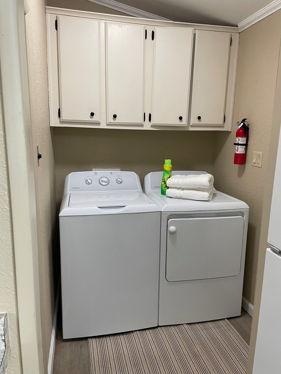 Laundry room with storage