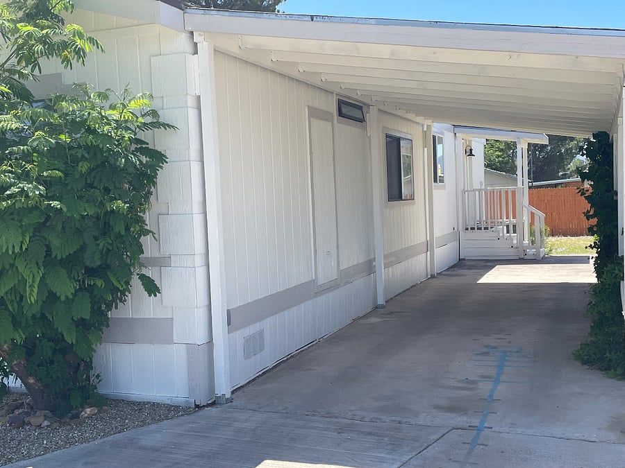 Covered parking with back door entrance