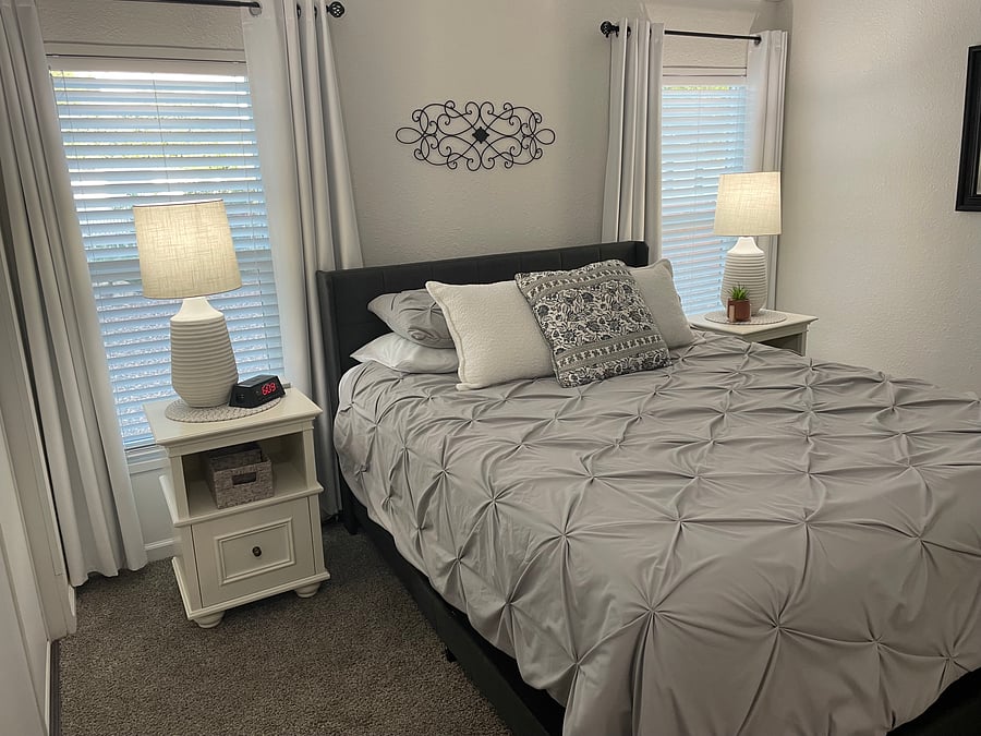 Primary bedroom with black out curtains