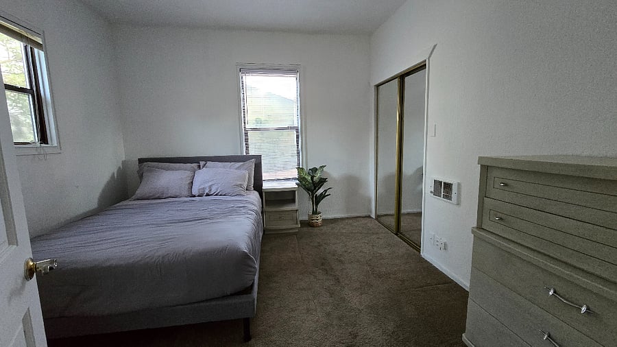 1st bedroom with queen sized bed