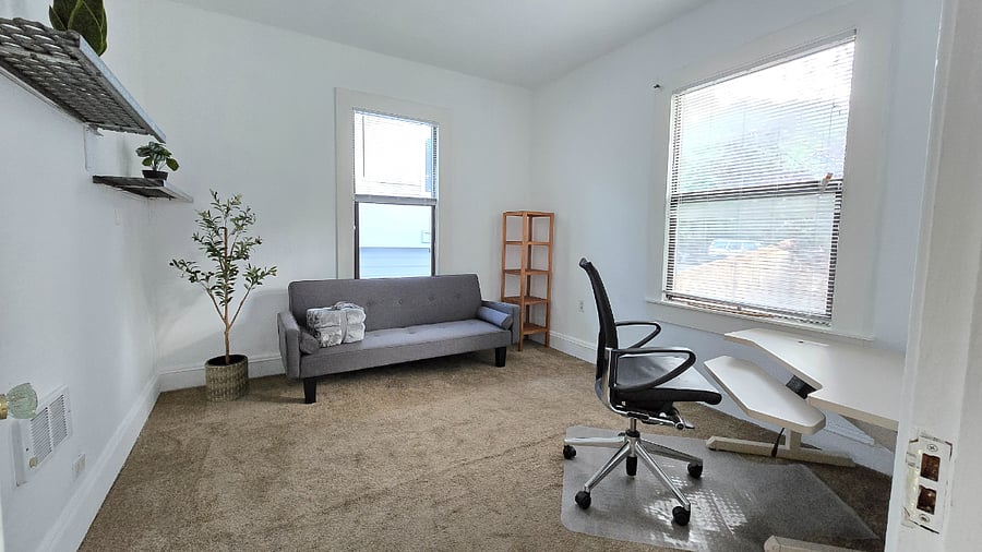 2nd Bedroom / Office: Sofabed and manual crank adjustable height desk; option to add Full Size bed into room for additional guest