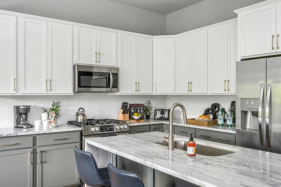 Spacious Kitchen, stocked with cookware and dishes. 