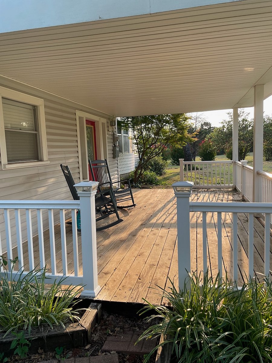 Relax and watch the wildlife while in a rocking chair on the cozy front porch.