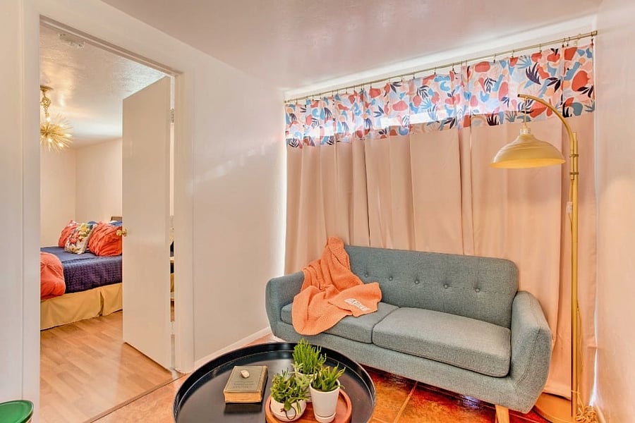 Escape into relaxation in the cozy study area adjacent to the master bedroom at Whitewood Farm. Equipped with a comfortable love seat and a selection of games and puzzles, it's the perfect retreat for some leisurely downtime.