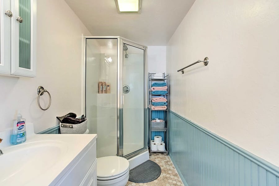 Whitewood Farm's master bath is equipped with a sink, toilet, and shower. Enjoy the convenience of towels, starters of shampoo, conditioner, body wash, and cleaning supplies which are all included in the rental cost.