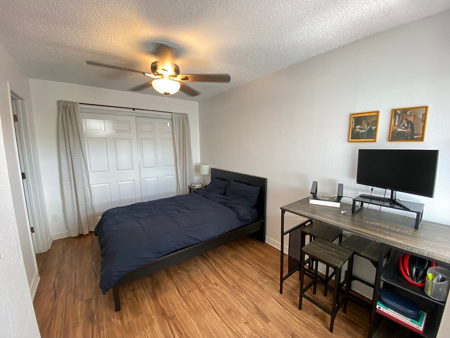 Full bed, desk, and large closet