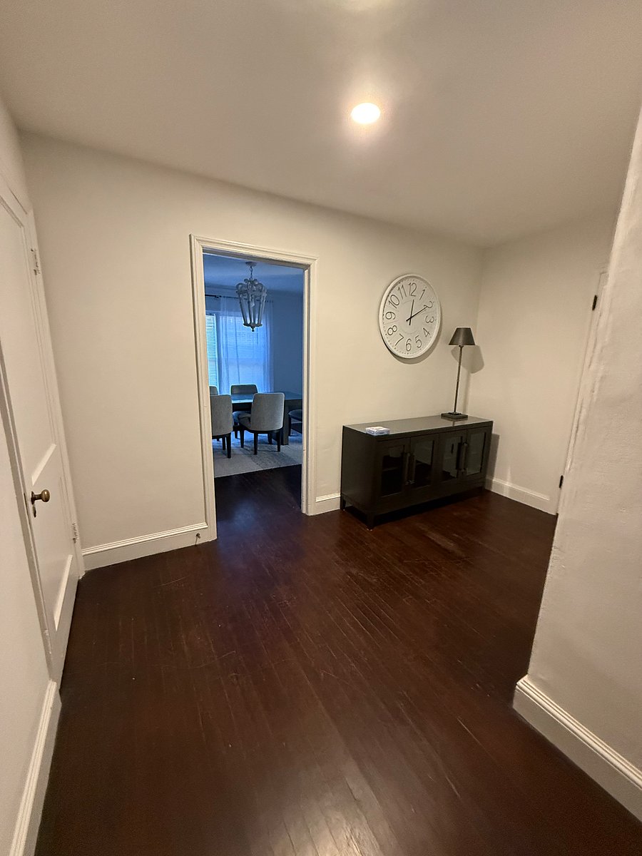 The hallway between the bedrooms and bathroom offers a convenient and functional transition space within the apartment. Its an ideal spot to set down keys, bags, or everyday essentials when coming and going, and it also serves as a great place to leave notes or reminders for your roommate. This hallway helps keep daily routines organized while maintaining a calm, easy flow throughout the home.
