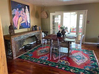 Dining room adjoins family room & leads into sunporch & backyard