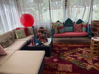 Sunporch with door to private back yard, fire pit & grill