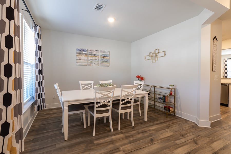 Large windows in the front flood the townhouse with natural light.