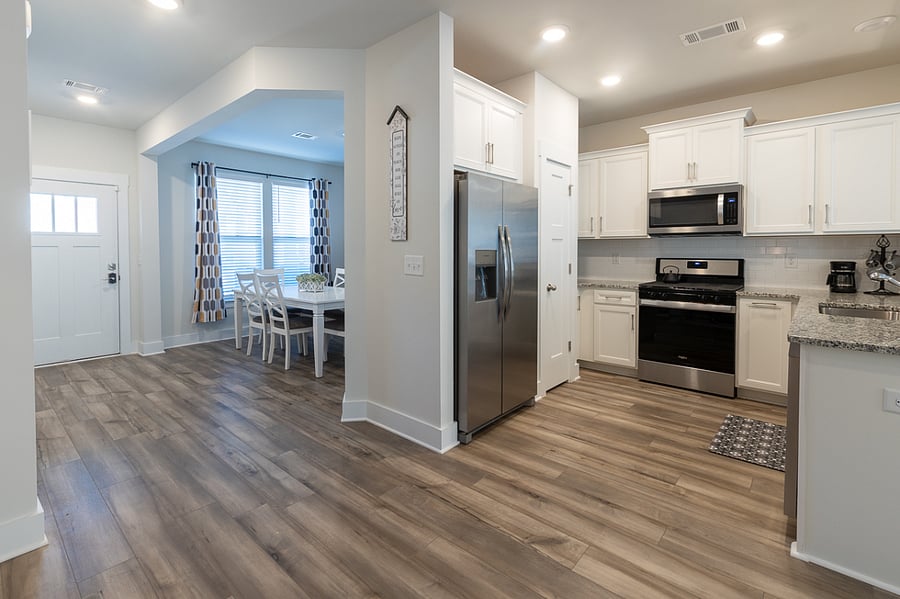The kitchen has plenty of storage and counter space as well as a pantry.