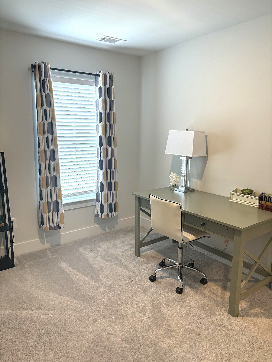 This multi-function bedroom has a desk for you to work as well as a full sized daybed for sleep.