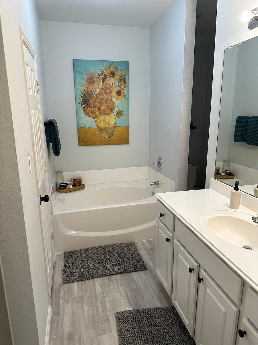 Master bathroom right off the master bedroom with shower and lounge tub
