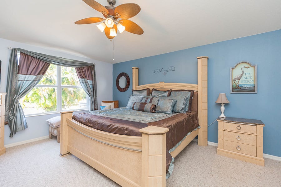 The Primary Suite has 2 walk-in closets with shelving.