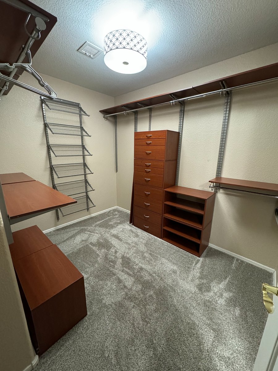 Huge walk in closet in primary bedroom