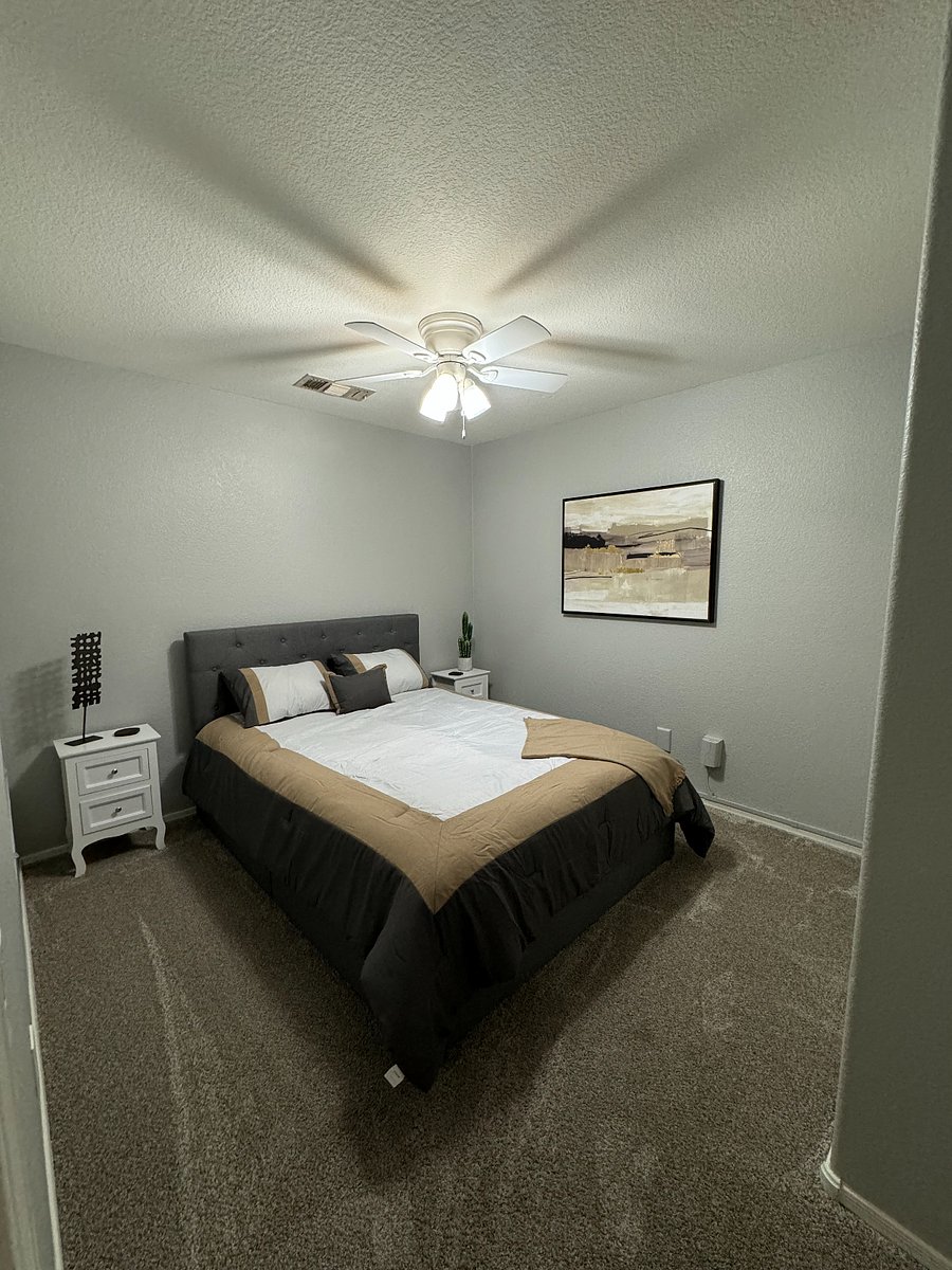 Queen bed with storage underneath mattress. Full size closet.