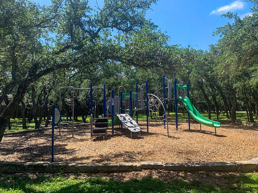 The next door neighbor is the beautiful community park that includes a playset, swings, a basketball court, pavilion and picnic tables.