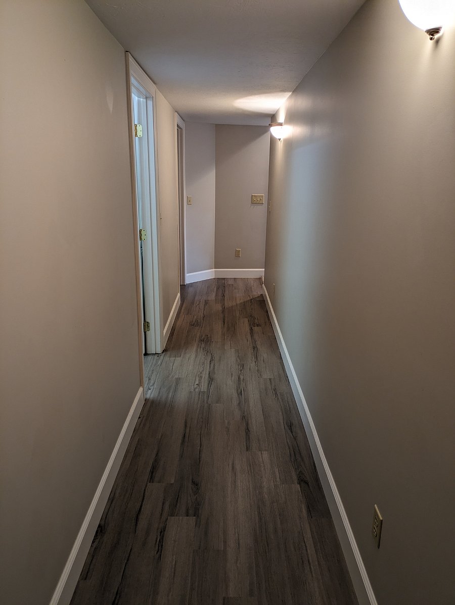Hallway to laundry room and convenience kitchen