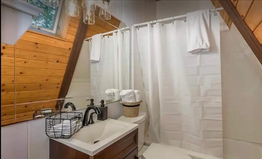 Full Bath with Tub.Bathroom has a hair dryer. Towels are inlcuded with the rental.