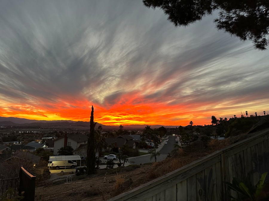 View of gorgeous sunset from backyard.
