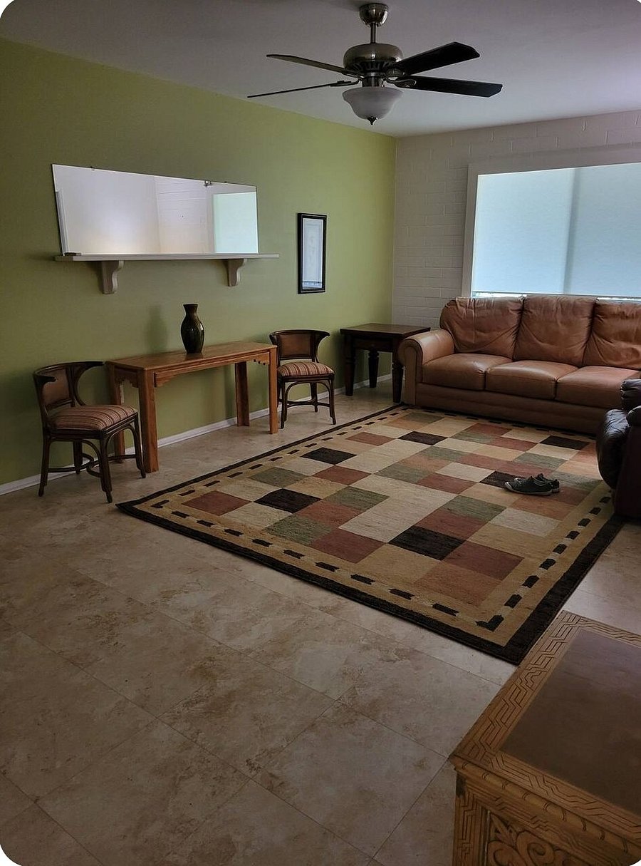 Large living room area with plenty of seating.
