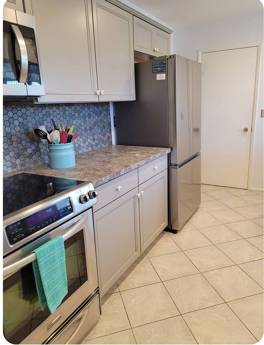 Newer kitchen completely remodeled with new stainless-steel appliances.