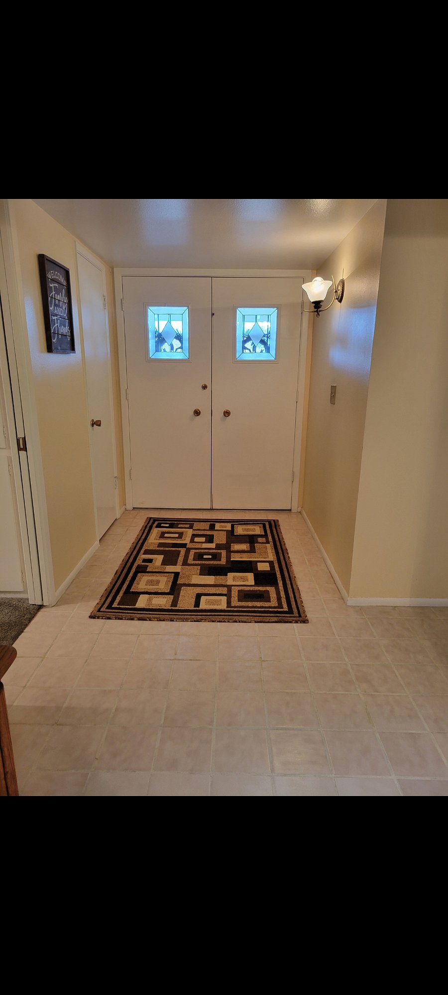 Front double door entry with keypad.
